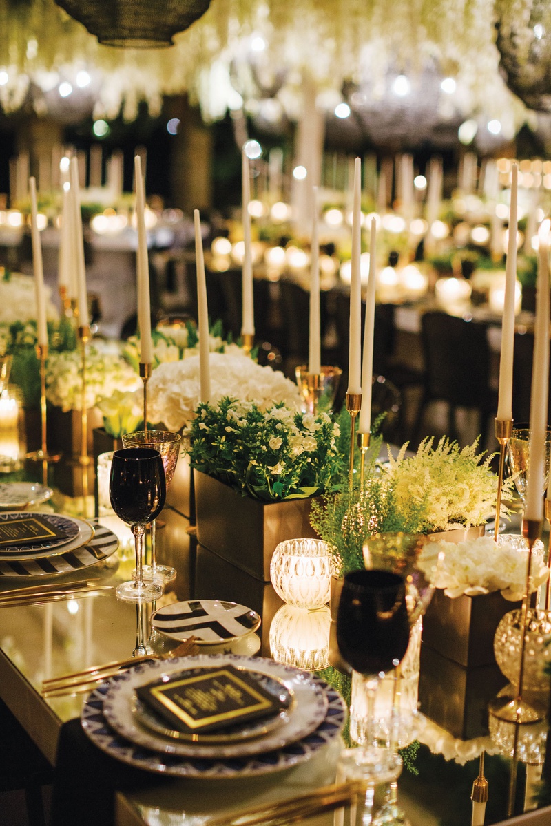 Black %26 Gold Reception Table Décor
Photography: Branco Prata
Read More:
http://www.insideweddings.com/weddings/luxe-destination-wedding-with-view-of-aegean-sea-in-mykonos-greece/1372/ wedding reception modern black white geometric designs taper candles greenery black glassware goblet