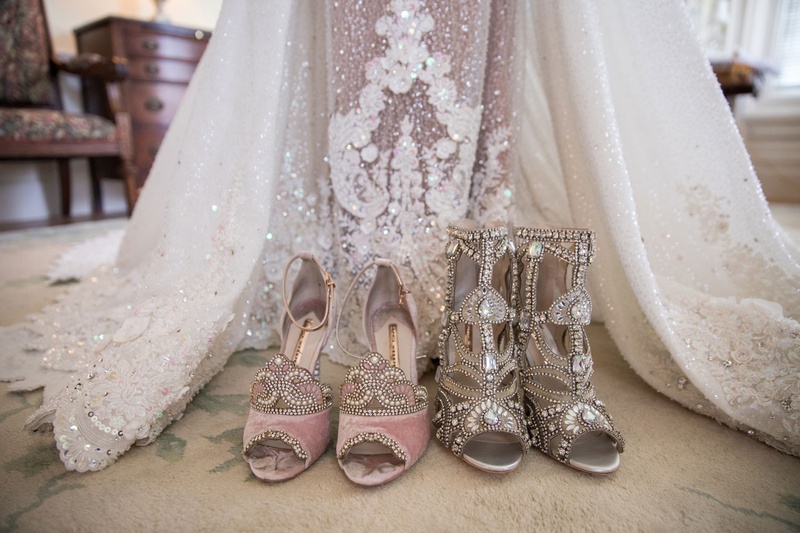 Two Pairs of Jeweled Bridal Shoes
Photography: Brian Bossany Photography
Read More:
http://www.insideweddings.com/weddings/luxurious-heaven-inspired-royal-wedding-celebration-in-minneapolis/1333/ christian louboutin and sophia webster shoes with haute couture dress ghana african royal wedding