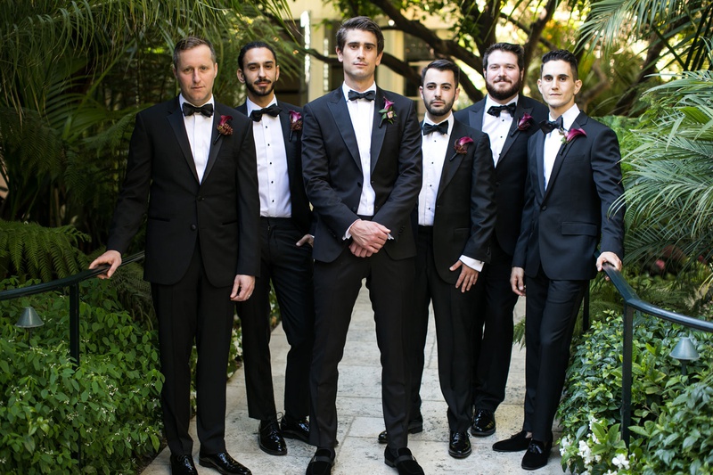 Groom %26 Groomsmen with Boutonnieres
Photography: Samuel Lippke Studios
Read More:
http://www.insideweddings.com/weddings/tuscany-meets-rustic-california-outdoor-wedding-under-the-stars/1336/ groom and groomsmen in tuxedos with burgundy calla lily boutonniere styles bow ties hotel bel-air