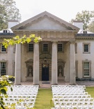 Outdoor Ceremony on Lawn of Historic Venue
Photography: Vue Photography
Read More:
http://www.insideweddings.com/weddings/a-wedding-planners-personalized-celebration-at-a-historic-mansion/824/ Atlanta History Center historic wedding venue with columns in Catching Fire Hunger Games movie white