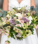 Full Bouquet with Lilac Accents
Photography: Vue Photography
Read More:
http://www.insideweddings.com/weddings/rustic-elegant-wedding-full-of-flowers-and-greenery-in-atlanta/1133/ full, wide bridal bouquet with different shades of greenery with blush flowers and lilac accents
