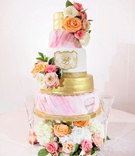 Pink, Coral %26 Gold Wedding Cake
Photography: Milanés Photography
Read More:
http://www.insideweddings.com/weddings/opulent-ballroom-wedding-with-coral-gold-color-palette-in-atlanta/1240/ wedding cake with gold layer monogram pink draped watercolor design fresh flowers