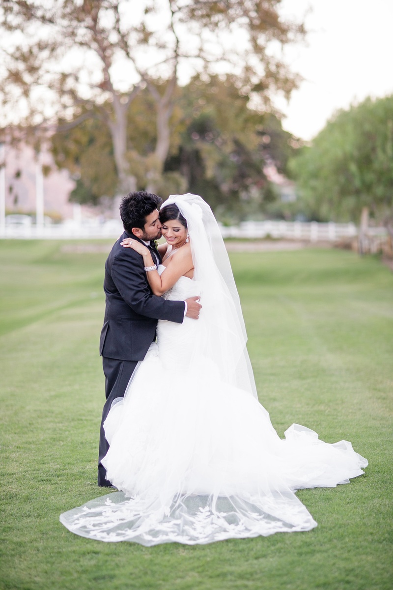 Rustic Wedding Couple
Photography: Jasmine Star Photography
Read More:
http://www.insideweddings.com/weddings/spanish-style-ceremony-outdoor-ranch-wedding-reception/504/ Bride and groom in grass after wedding ceremony
