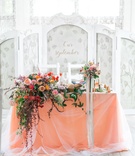 Salmon Sweetheart Table, Bold Arrangement
Photography: Julia Elinecka Photography
Read More:
http://www.insideweddings.com/weddings/orthodox-christian-ceremony-intimate-celebration-in-ukraine/882/ salmon sweetheart table bold floral arrangement scheme hanging down Ukrainian kiev kyiv reception