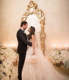 Bride %26 Groom in Front of Gold Mirror
Photography: The Day by Ira Lippke
Read More:
http://www.insideweddings.com/weddings/opulent-luxury-wedding-with-timeless-color-palette-in-new-york-city/1199/ wedding portrait bride and groom long hair gold mirror white flowers candles the plaza hotel