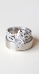 Marquise-Cut Diamond Engagement Ring
Photography: Aaron Delesie Photographer
Read More:
http://www.insideweddings.com/weddings/snowy-spring-celebration-in-aspen-colorado/596/ Wedding bands and split shank diamond ring