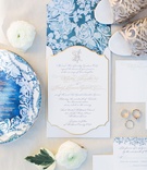 White, Blue %26 Gold Invitation
Photography: Heather Rowland Photography %26 Thisbe Grace Photography
Read More:
http://www.insideweddings.com/weddings/gorgeous-blue-white-gold-wedding-with-lush-greenery-in-texas/1107/ Wedding invitation with white flowers on blue background gold border calligraphy monogram