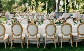 Outdoor Garden Wedding Reception
Photography: Our Two Hearts
Read More:
http://www.insideweddings.com/weddings/romantic-whimsical-outdoor-garden-wedding-reception-inspiration/1319/ outdoor garden wedding reception oval back french style chairs long table short centerpieces trees