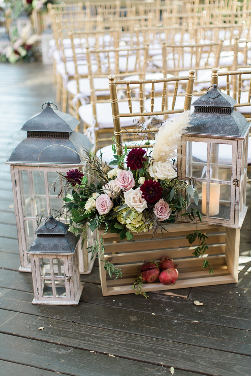 Lanterns, Flowers, and Pomegranates
Photography: Hello Blue Photo
Read More:
http://www.insideweddings.com/weddings/boho-chic-wedding-with-traditional-jewish-ceremony-in-malibu/1156/ rustic fall ceremony decor with lanterns, blush roses, wine red dahlias, pampas grass, pomegranates