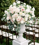 White Ceremony Urn with Muted Flowers
Photography: Brett Hickman Photographers
Read More:
http://www.insideweddings.com/weddings/taylour-rutledge-and-shane-vereen/1276/ white riser white urb vase blush pink and white rose eucalyptus outdoor ceremony decorations flowers