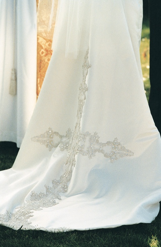 Cross-Embellished Wedding Dress
Photography: Jon Nickson Photography
Read More:
http://www.insideweddings.com/weddings/crystal-cove-wedding-with-sophisticated-beach-theme/92/ Cross embellishments on white wedding dress