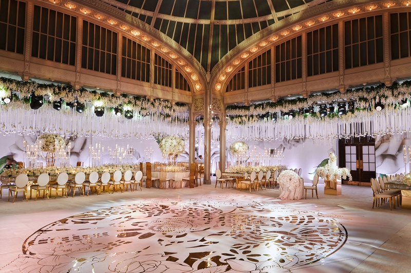Circular Gold Design on Dance Floor
Photography: Christian Oth Studio
Read More:
http://www.insideweddings.com/weddings/traditional-cathedral-wedding-luxury-reception-in-new-york-city/1331/ wedding reception new york public library gold design on large dance floor roses hanging from arches