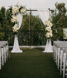 Draped Arch with Ivory Flowers
Photography: Kevin Le Vu Photography
Read More:
http://www.insideweddings.com/weddings/california-rooftop-wedding-with-a-modern-twist-on-old-hollywood/1159/ rooftop wedding, simple arch with white drapery and ivory flowers