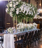 Soft Fabric Runner on Wood Table
Photography: AndySeo Studio
Read More:
http://www.insideweddings.com/weddings/romantic-wedding-with-lush-florals-at-1920s-venue-in-long-beach/1329/ long wooden table with sheer white fabric runner and white and green centerpiece on gold stand
