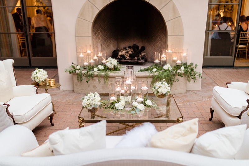 Lounge by Fireplace
Photography: Chard Photo
Read More:
http://www.insideweddings.com/weddings/alfresco-ceremony-on-the-coast-classic-ballroom-reception/1290/ the resort at pelican hill wedding reception, liunge area in front of fireplace, candles
