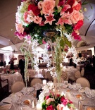 Pink Floral Centerpiece
Photography: Studio Nine Photography
Read More:
http://www.insideweddings.com/weddings/romantic-summer-chateau-wedding-in-new-jersey/324/ Tall round wedding centerpiece with pink and white flowers