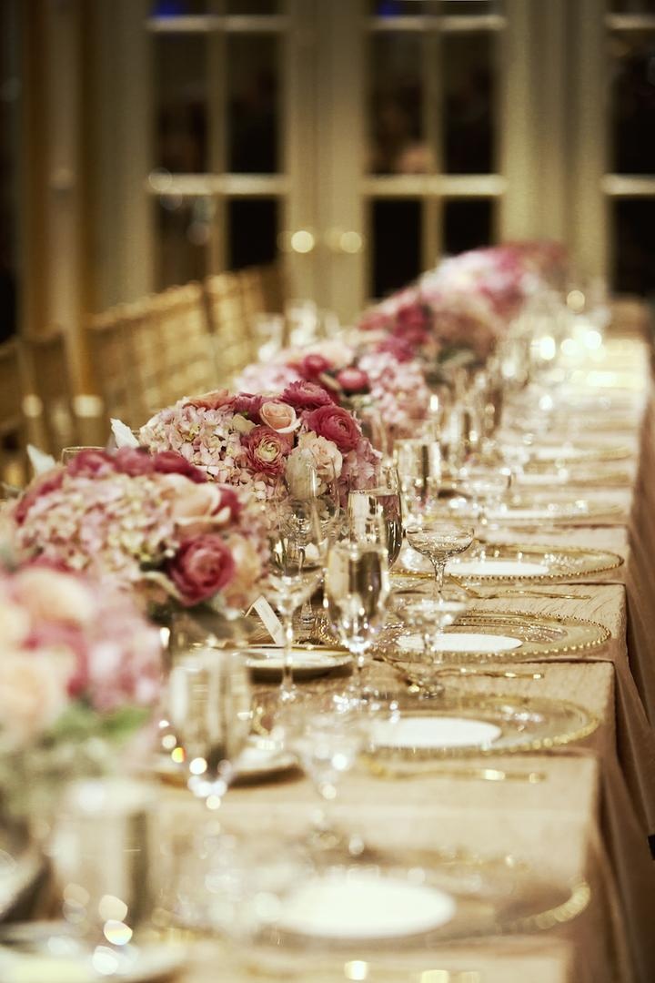 Banquet Table Décor
Photography: Catherine Hall Studios
Read More:
http://www.insideweddings.com/weddings/metropolitan-san-francisco-wedding-at-luxury-hotel/411/ Gold-rimmed charger plates and pink floral arrangements