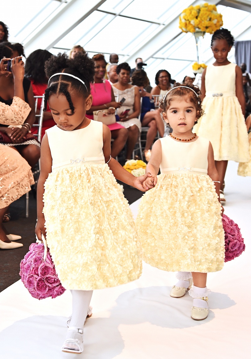 Flower Girls with Rose Pomander Bouquets
Photography: Carasco Photography
Read More:
http://www.insideweddings.com/weddings/city-wedding-at-chicago-planetarium-with-purple-yellow-palette/688/ Two flower girls in short sleeve pastel yellow dresses carry pomander bouquets of light purple roses