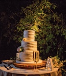 Wedding Cake Table at Outdoor Reception
Photography: Apertura
Read More:
http://www.insideweddings.com/weddings/warm-inviting-outdoor-fall-wedding-with-romantic-rustic-details/1363/ wedding cake three layer round design champagne marquee letter outdoor wedding reception