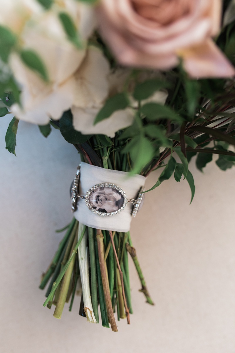 Bouquet Charms of Lost Loved Ones
Photography: Hello Blue Photo
Read More:
http://www.insideweddings.com/weddings/boho-chic-wedding-with-traditional-jewish-ceremony-in-malibu/1156/ bouquet charms with photos of loved ones who had passed away