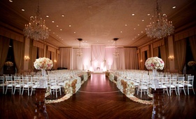 Wood Floor Ballroom Ceremony
Photography: Bob %26 Dawn Davis Photography
Read More:
http://www.insideweddings.com/weddings/glamorous-ballroom-wedding-with-personalized-details-in-chicago/952/ Ballroom wedding chicago wood floor flower petal wall aisle and arrangements chandeliers