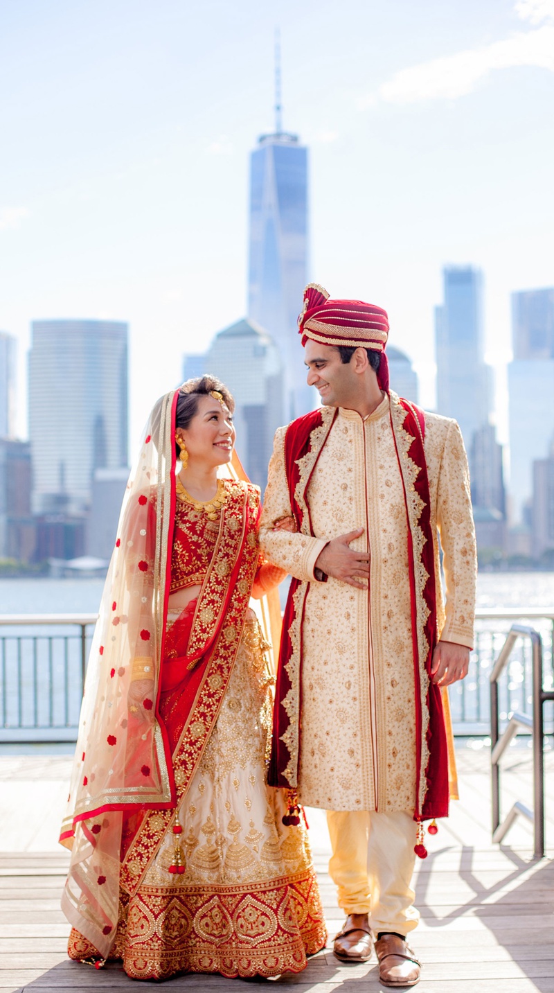 Akina Uchida %26 Nirav Mehta
Photography: Clane Gessel Photography
Read More:
http://www.insideweddings.com/weddings/colorful-city-view-wedding-featuring-indian-and-japanese-traditions/1353/ bride in red and gold traditional wedding attire for indian ceremony groom with view of new york