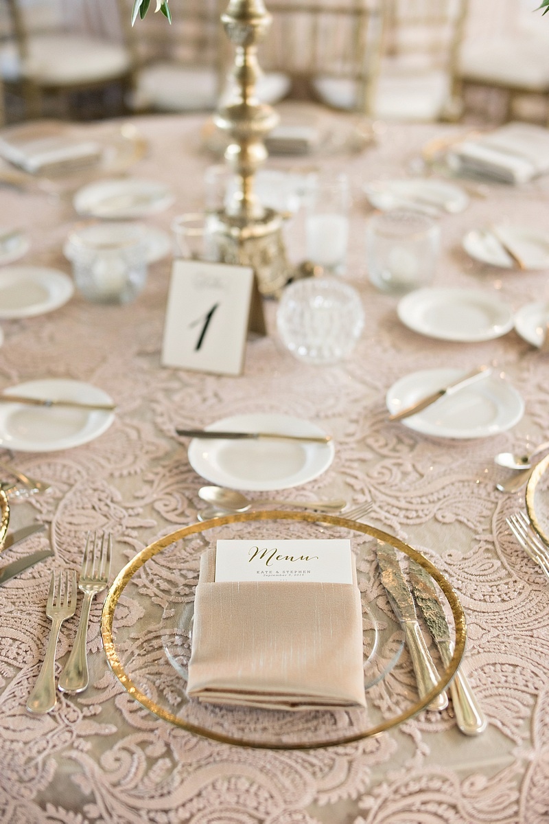 Elegant Blush and Gold Place Setting
Photography: Laurie Bailey Photography
Read More:
http://www.insideweddings.com/weddings/oceanfront-wedding-ceremony-classic-romantic-ballroom-reception/854/ gold-rimmed glass chargers, gold flatware, blush linens