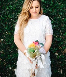 Bride-to-Be with Flower %26 Ribbon Bouquet
Photography: Frances Iacuzzi Photography
Read More:
http://www.insideweddings.com/weddings/bridal-shower-with-bright-cheerful-color-palette-in-beverly-hills/1203/ bride in white short sleeved dress with flower applique holding bouquet with gift ribbons shower