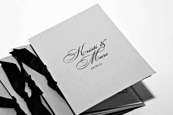 Black And White Photo Of Wedding Program With Ribbon Black And White Photo Of Wedding Program With Ribbon