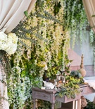 Rustic-Elegant Ceremony Chuppah Setting
Photography: Kevin Weinstein Photography
Read More:
http://www.insideweddings.com/weddings/high-school-sweethearts-say-i-do-at-personalized-jewish-wedding/977/ Tan drapery white flowers rustic table antlers kiddush cup Jewish wedding flower wall ceremony