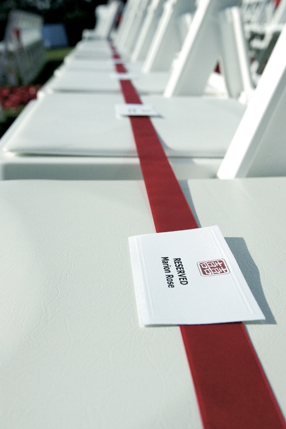 Reserved Ceremony Seating
Photography: Ventana Photography
Read More:
http://www.insideweddings.com/weddings/black-and-red-wedding-on-golf-course-at-the-lodge-at-torrey-pines/122/ Long red ribbon on ceremony chairs labeled reserved seats