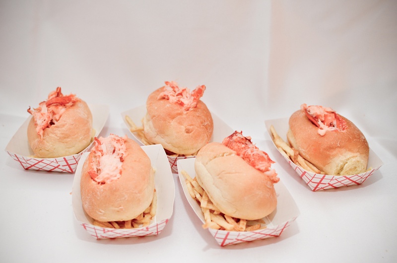 Local Lobster Rolls
Photography: Jana Williams Photography
Read More:
http://www.insideweddings.com/weddings/ivory-gold-blush-lakefront-new-hampshire-wedding/412/ To-go containers with french fries and lobster rolls