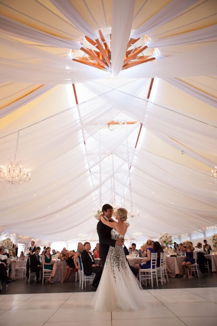 Tent Wedding Dance
Photography: Carrie Rodman Photography
Read More:
http://www.insideweddings.com/weddings/new-england-summer-wedding-by-the-seashore/429/ Bride and groom dance under draped reception tent