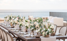 Romantic Low Centerpieces
Photography: Collin Pierson Photography
Read More:
http://www.insideweddings.com/weddings/beach-wedding-ceremony-romantic-reception-inspiration-in-cabo/1304/ wedding reception centerpiece outdoor vase candle lisianthus rose foliage french chair oval back