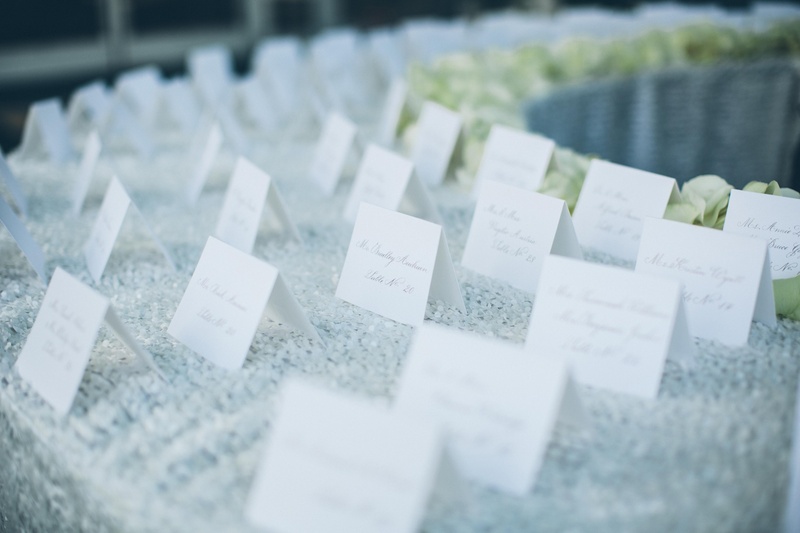White Escort Cards
Photography: David %26 Tammy Molnar
Read More:
http://www.insideweddings.com/weddings/an-exquisite-backyard-wedding-in-tennessee/532/ Sequined linens topped with simple seating card