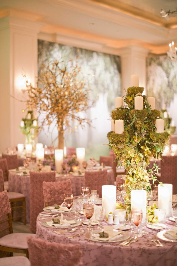 Woodsy-Theme Wedding
Photography: Harwell Photography
Read More:
http://www.insideweddings.com/weddings/romantic-woodland-inspired-atlanta-wedding-with-natural-details/433/ Pink rosette chair covers and embroidered table linens