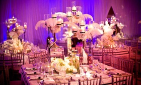 Hollywood Glam Wedding Reception
Photography: Jay Lawrence Goldman Photography
Read More:
http://www.insideweddings.com/weddings/beachside-affair-in-santa-monica-california/289/ Mirror centerpiece with candles, feathers, and flowers