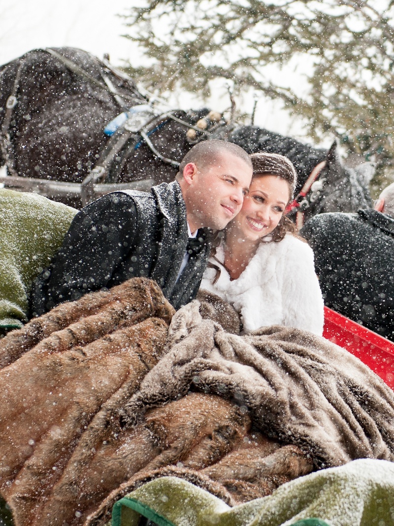 Couple in the Snow
Photography: Handeland Tesoro Photography
Read More:
http://www.insideweddings.com/weddings/snowy-outdoor-winter-ceremony-cozy-lodge-reception/522/ Winter wedding bride and groom with blankets