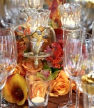 Red %26 Orange Floral Arrangement
Photography: Christofer Jae Photography
Read More:
http://www.insideweddings.com/weddings/classic-city-wedding-in-san-francisco-california/154/ Close up of glassware and calla lily centerpiece