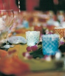 Tropical Candleholders and Flowers
Photography: Cari Pike Photography
Read More:
http://www.insideweddings.com/weddings/tropical-beach-wedding-in-santa-monica-california/28/ Island decor with blue votive candleholders
