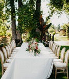Summer Garden Wedding Décor
Photography: Our Two Hearts
Read More:
http://www.insideweddings.com/weddings/romantic-whimsical-outdoor-garden-wedding-reception-inspiration/1319/ wedding reception inspiration long table low centerpiece garden style wood upholstery chairs trees