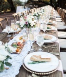 Extended Wooden Tables, Lace Runner, Florals
Photography: Katie Shuler Photography
Read More:
http://www.insideweddings.com/weddings/rustic-chic-outdoor-wedding-at-a-winery-in-northern-california/945/ extended wooden tables lace runner florals simple rustic chic wedding reception winery bread