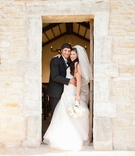 Lynette Byler %26 Rowdy Parrott
Photography: Michael Carr Photography
Read More:
http://www.insideweddings.com/weddings/glamorous-outdoor-wedding-with-rustic-rose-gold-details-in-texas/842/ Young bride in Monique Lhuillier wedding dress and groom in suit at chapel in Texas
