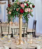 Romantic Centerpiece on Gold Stand
Photography: David Manning Photographer
Read More:
http://www.insideweddings.com/weddings/interfaith-ceremony-tented-reception-with-romantic-color-palette/885/ red garden roses, ivory and blush roses, greenery, gold stand