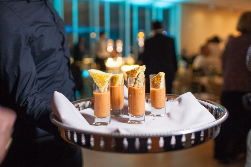 Grilled Cheese with Tomato Soup Shooters
Photography: Eric Kelley
Read More:
http://www.insideweddings.com/weddings/summer-wedding-with-clean-color-palette-modern-design-in-chicago/776/ mini grilled cheese with tomato soup shooters, late night snacks at wedding reception