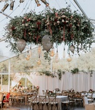 Tented Wedding with Large Floral Installation
Photography: Grant Daniels Photography
Read More:
http://www.insideweddings.com/weddings/outdoor-ceremony-tented-reception-with-cozy-fall-color-palette/1183/ wedding reception tent wedding flower chandelier edison lightbulb vineyard chairs rustic decor