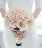 Simple Blush Rose Bouquet
Photography: Amy %26 Stuart Photography
Read More:
http://www.insideweddings.com/weddings/rustic-elegant-outdoor-ceremony-luxe-garden-inspired-reception/869/ Wedding bouquet of single flower type light pink roses with white wrap