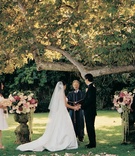 Outdoor Ceremony Décor
Photography: Miki and Sonja Photography
Read More:
http://www.insideweddings.com/weddings/shabby-chic-garden-wedding-in-malibu-california/112/ Bride and groom married alfresco under tree
