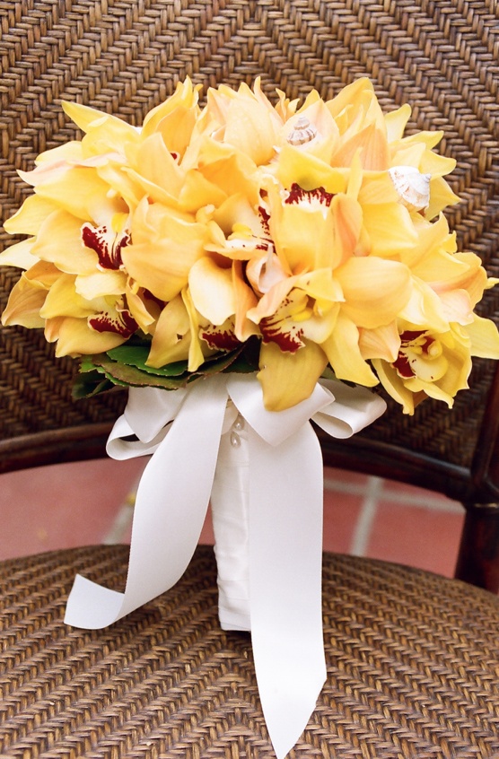 Yellow Orchid Bouquet
Photography: frame.thirty.six photography
Read More:
http://www.insideweddings.com/weddings/tropical-inspired-spring-wedding-at-the-bel-air-bay-club/236/ Wedding bridal bouquet with tropical yellow orchids