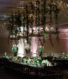 Wedding Reception with "Floating" Candles
Photography: Studio This Is
Read More:
http://www.insideweddings.com/weddings/whimsical-wedding-in-chicago-with-inspiration-from-national-parks/1272/ wedding reception dark decor green white flower greenery hanging centerpiece vines candles